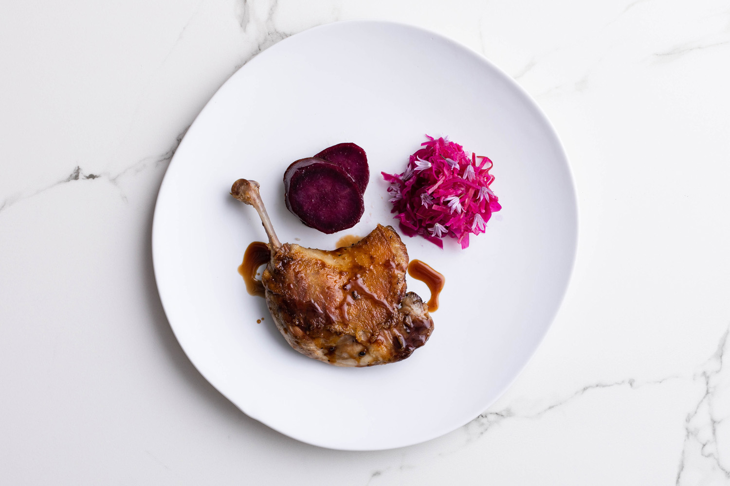 crispy duck confit with kumara pickled cabbage recipe