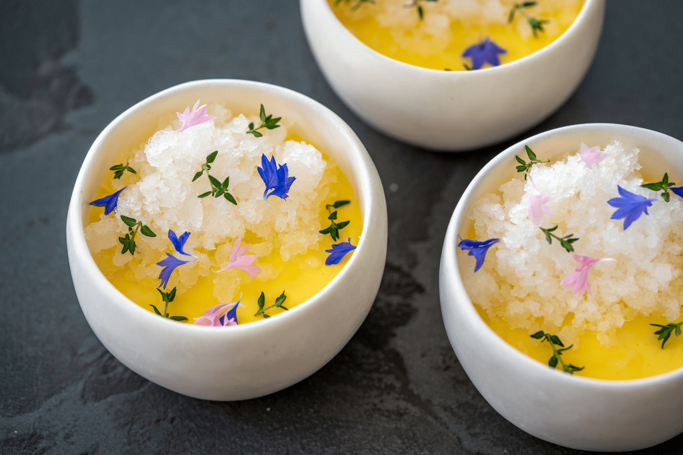yellow panna cotta with edible flowers
